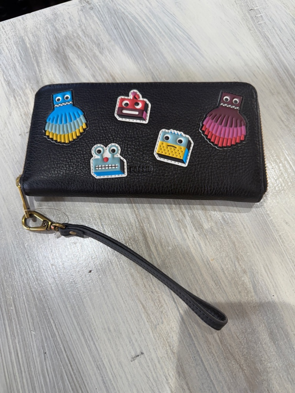 Rare Fossil Emma Black Zip-Around Wristlet with Colorful Robot Appliqués